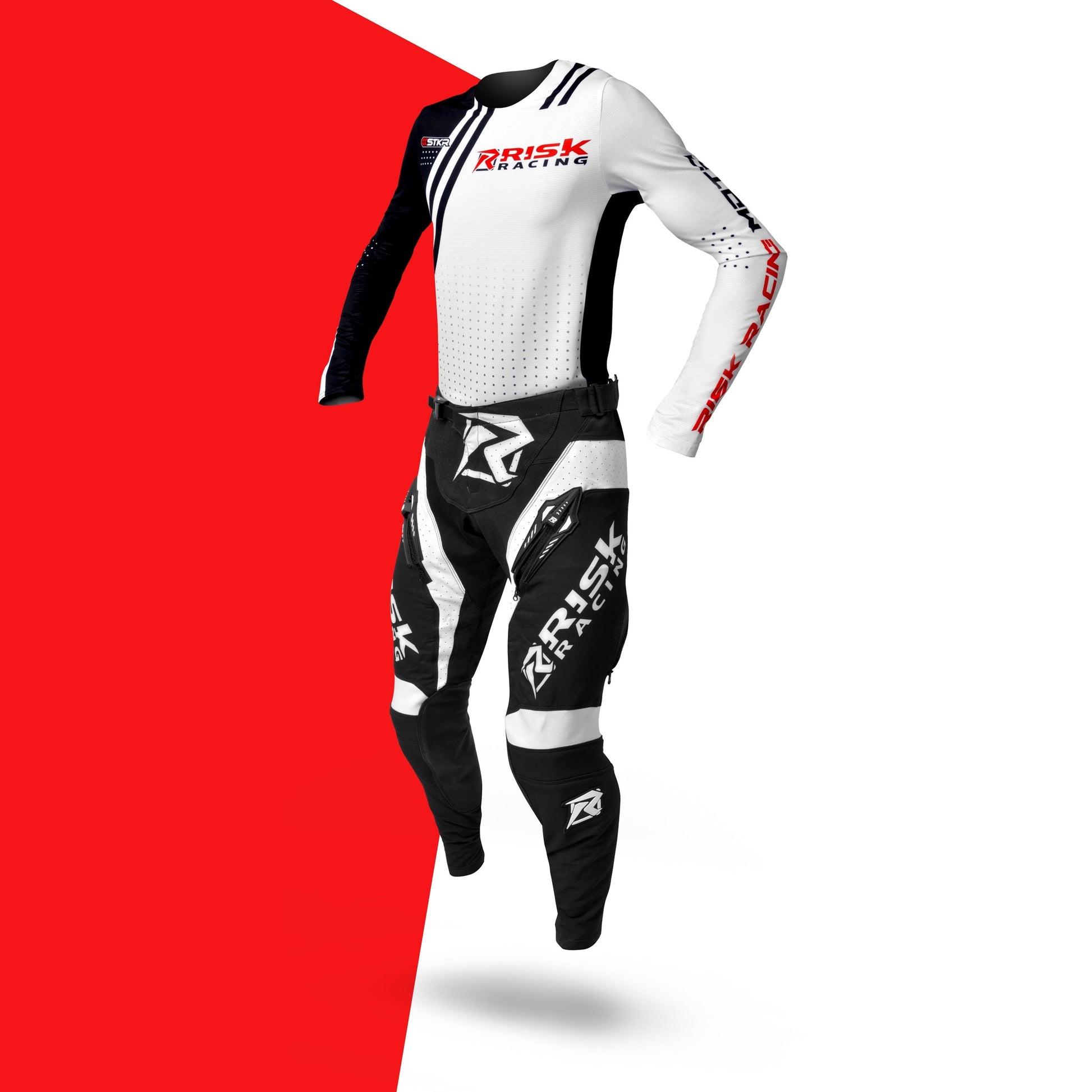 Risk Racing Motocross Jersey White Black shown with a pair of VENTilate PRO pants on a red and white background